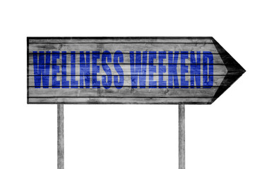 Wellness Weekend wooden sign isolated on white