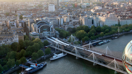 Beautiful view on London's north-western part from London Eye tourist attraction wheel: cityscape, BT Tower, Charing Cross Station, Centre Point and bridge over Thames river