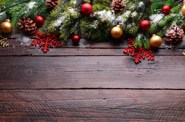 Fototapeta na wymiar Christmas decoration frame on wooden background