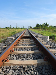 Railway tracks in a rural scene with sunny day. It is classical