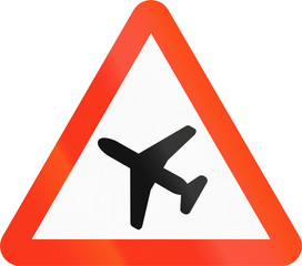 Bangladeshi sign warning about air traffic over the road