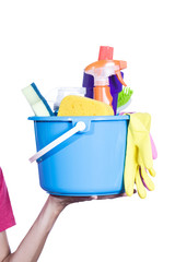 woman with cleaning equipment ready to clean house