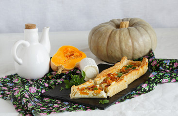 tart with goat cheese, jamon, basil