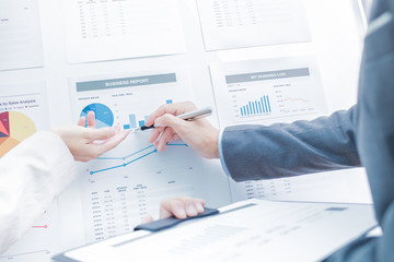 Business people discussing the charts and graphs showing the res