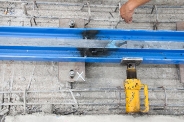 crane railway with yellow tools