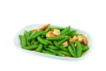 Fried shrimp with fresh peas.
