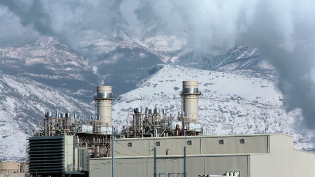 Power plant smoke stacks steam smoke winter helicopter fast timelapse HD 0195