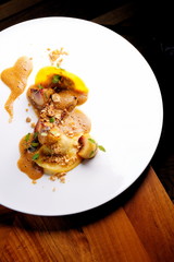 Haute cuisine, roasted Foie gras with homemade ravioli and apples