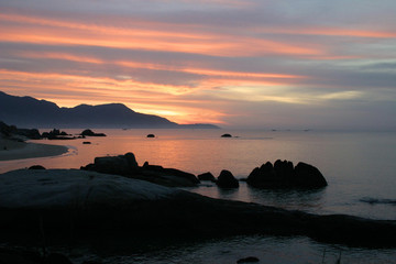 Sunrise on the rocky coast
