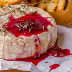Camembert with berry jam, toast and thyme.