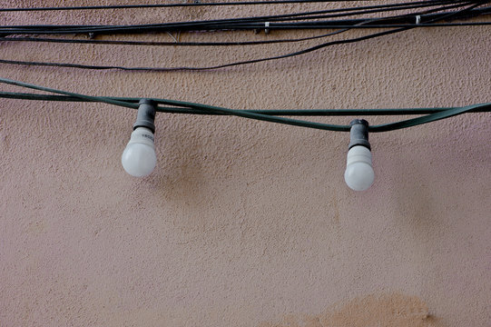 energy saving white light bulbs in the street wall of the house