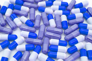 Pills on white background