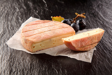 Round of creamy soft aromatic French cheese