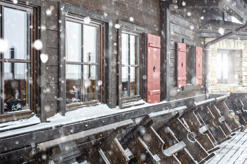 snow-covered restaurant in mountains - obrazy, fototapety, plakaty