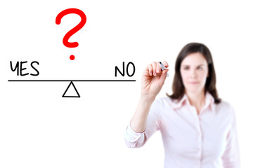 Young business woman writing yes and no compare on balance bar. Isolated on white background.
