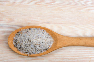unrefined natural sea salt in a spoon