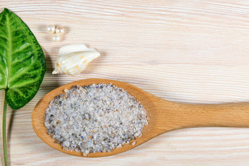 unrefined natural sea salt in a spoon