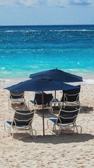 Summer sand beach blue umbrellas