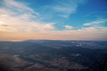 Air balloon over the field with blue sky. View