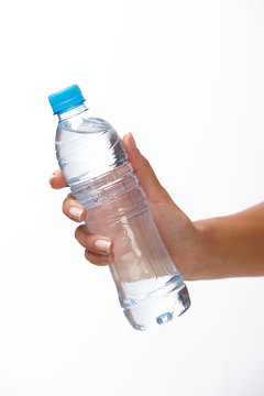 woman hand with bottle of water