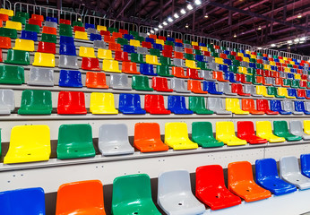 rows of colorful chairs on the podium