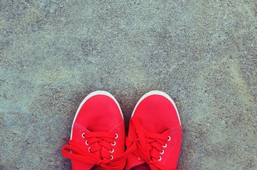 Pair of red shoes outdoors