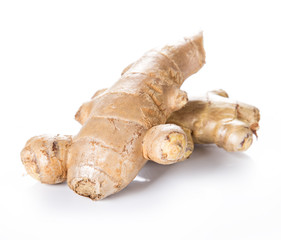 Fresh ginger root on wooden background.