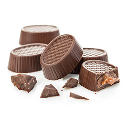 Chocolate candies close-up isolated on a white background.