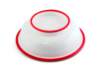 Babby bowl upside down with silicone circle isolated on white in