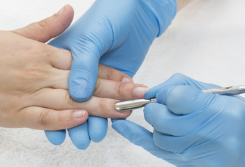 woman doing manicure beauty salon varnish wellness