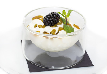 cottage cheese with sour cream and raisins on a white background