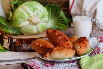 pies cabbage and jug of milk still life with a birch cut