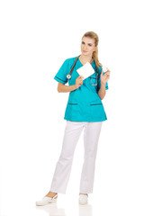 Female nurse holding gauze and hydrogen peroxide