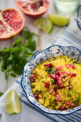 Vegetarian salad, couscous and pomegranate
