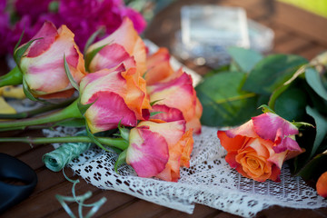 flowers and tools on the table, florist workplace, still life