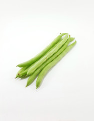 Whole green beans on white background