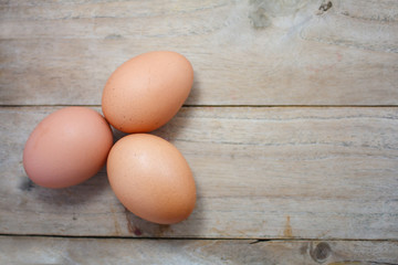 Eggs on wood background
