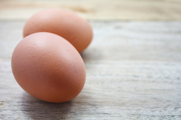 Eggs on wood background