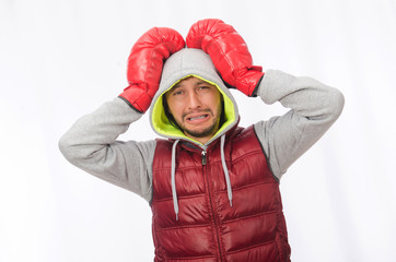 Man wearing boxing gloves isolated on white