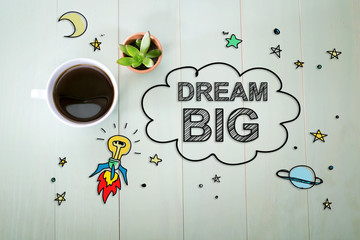Dream Big concept with a cup of coffee