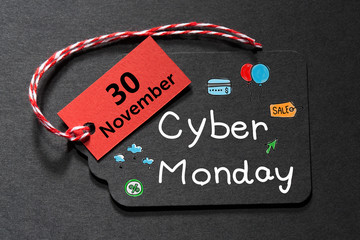 Cyber Monday November 30 text on a black tag
