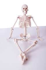 Skeleton in funny concept on white