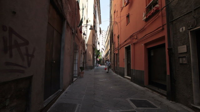 Savona Italy dark narrow alley men P HD 0417