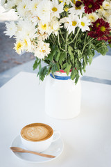 Hot art Latte Coffee in a cup on table