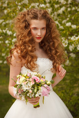 Young bride with flowers