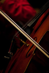 The fiddlestick  on the strings cello closeup
