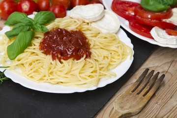 Spaghetti with tomato and fork