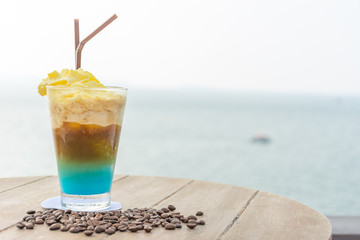 Coffee frappe with beautiful sea in background
