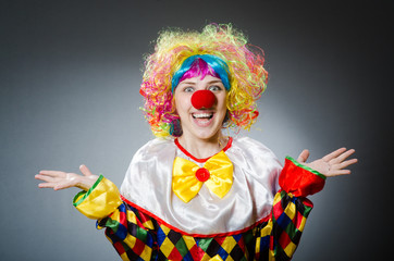 Funny clown in comical concept