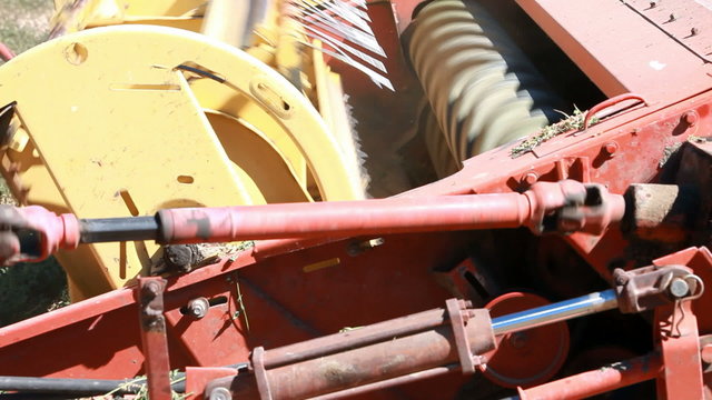 Farm swather turning P HD 0852